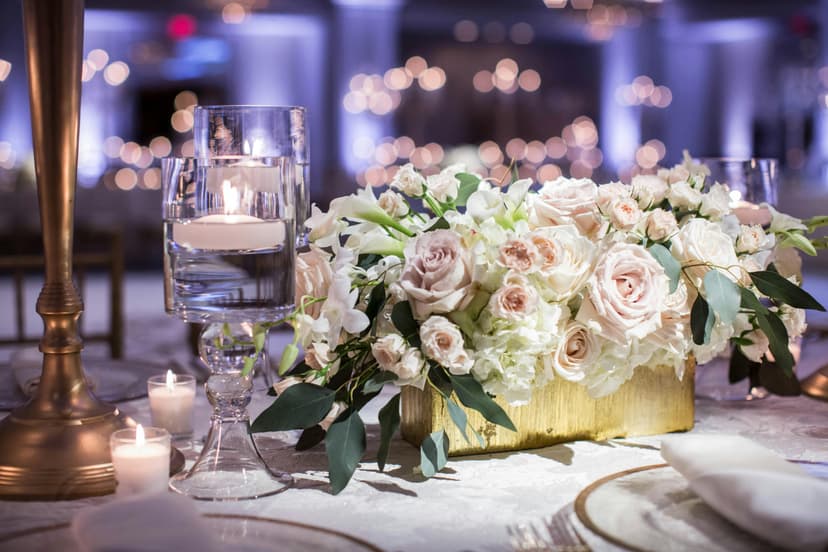 Sophisticated wedding reception with luxury table settings and catering